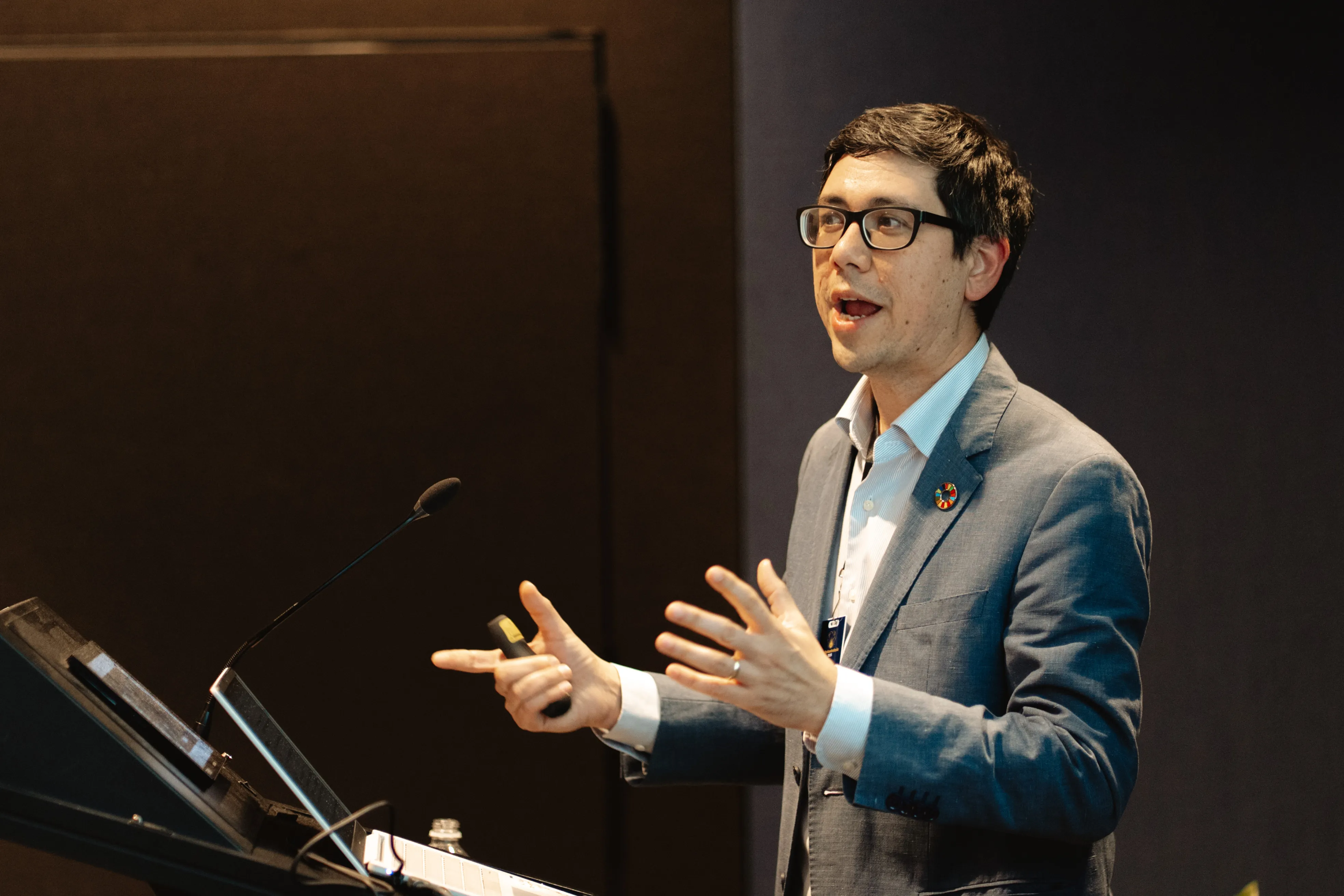 Alexander K Saeri speaking at the EA Global conference, November 2025